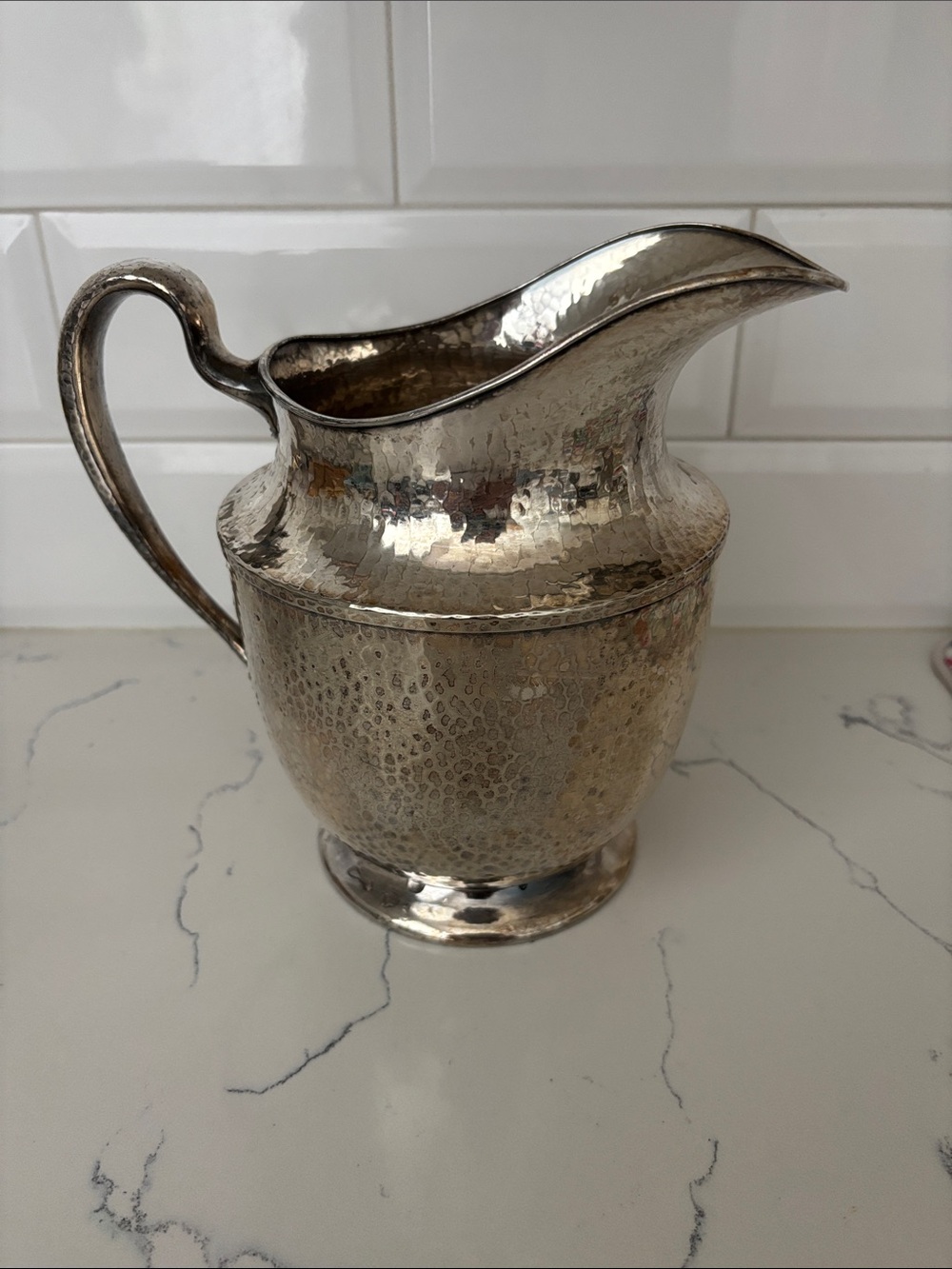 Hammered Metal Pitcher in Silver Tone